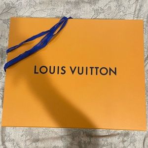 Large Louis Vuitton box with ribbon